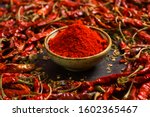 spicy red chilli powder with super chilli background