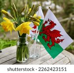 Small photo of St David's Day daffodil and welsh flag display - national symbols of Wales. Cefnogi Cymru Support Wales. Dydd Gwyl Dewi St David’s Day