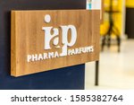 Small photo of BOLOGNA, ITALY - APRIL 12, 2019: light is enlightening IAP logo in Cosmofarma Exhibition, the pharmacy world’s leading European event for the Health Care and Beauty Care sectors