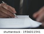 Small photo of Signing contract, business agreement, deal concept. Businessman signing official contract, formal document, close up. front view. Man manager proofing terms and condition of business document