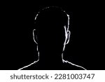 Small photo of dark backlight shadow silhouette of male person, incognito unknown profile