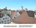 Panoramic view over red roofs of bavarian city Regensburg, Germany.Regensburg. View of the facades and tiled roofs of the old city.