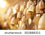 Many Golden Buddhist Bells With ...