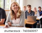 Mature Woman In College Attending Adult Education Class