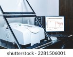 Small photo of Fourier Transform Infrared Spectroscopy FTIR instrument with the IR spectrum of sample was analysed as shown on the monitor. FTIR was used to identify the chemical identity of drug or sample analysed