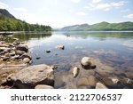 View Of Water And Rocks With...