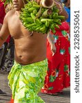 Small photo of Fruit Bearer: Polynesian Man at Heiva Festival in Tahiti