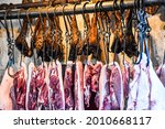 Fresh Pork Meat Hanging At The...