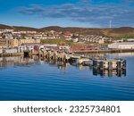 Small photo of Lerwick, UK - Apr 27 2023 - The Holmsgarth Ferry Terminal pier in Lerwick, Shetland, UK. Northlink Ferry services use the terminal for services to Aberdeen and Kirkwall in Orkney.