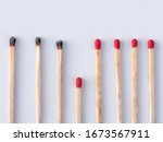 Small photo of Matchsticks burn, one piece prevents the fire from spreading - the concept of how to stop the coronavirus from spreading: stay at home. Flat lay. Close up