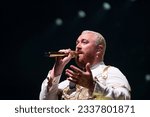 Small photo of MIAMI, FLORIDA - JULY 25, 2023: Sam Smith performs at the Kaseya Center in Miami, Florida. This was the opening night of the North American leg of their "Gloria the Tour" world tour.