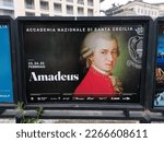 Small photo of Rome, Italy - February 21, 2022, advertising sign for the concert of the Orchestra and Chorus of the National Academy of Santa Cecilia entitled Amadeus, Manfred Honeck.