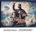 Small photo of Rome, Italy - July 11, 2023, detail of the movie poster Indiana Jones and the Dial of Fate.