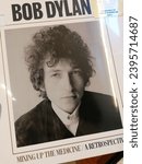 Small photo of Rome, Italy - December 01, 2023, detail of the cover of the book Bob Dylan: Mixing up the Medicine.