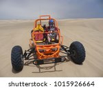 Man Driving A Sand Buggy In...