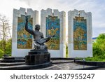 Small photo of Elista, Kalmykia, Russia - May 9, 2022: Monument to Djangarchi Eelyan Ovla in Elista, capital of Kalmykia republic. Dzhangarchi, Kalmyk rhapsodist, folk storyteller and singer of Kalmyk epic Dzhangar