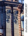 Small photo of Shanghai,China- Sept 1,2013:zElements of decorative stucco, fretwork and bas-reliefs on the facade of an old building,The Bund,Shanghai,China.