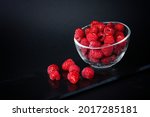 Fresh Raspberries In A Ceramic...