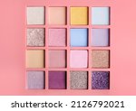 Make up eyeshadow multicolor palette. Colorful bright eye shadows set for visage. Сosmetic background.