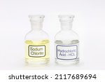 Small photo of bottle of sodium chlorite next to activator Hydrochloric acid HCL, purifying chemicals and powerful disinfectants