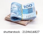 Small photo of many hundred and fifty reais banknotes, brazilian money, grand prize, payment, salary, on isolated white background