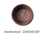 Empty cupcake baking cases pack isolated on white background, top view. Brown greaseproof paper baking cups. Muffin cases, cupcake liners