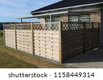 Wooden fence. Terrace fence. Wooden fence with privacy lattice screen.