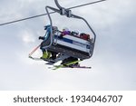 Small photo of 2021.03.06, Russia, Moscow, Vorobyev Mountains. A modern system of ski-climbing mechanisms. People in gear climb