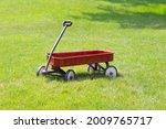 Red Cart At The Garden On Summer