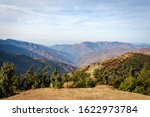 Small photo of Mountains layered views from the top of Nag Tibba base camp located in Dehradun Uttarakhand India. Aerial view of the mountains on Nag Tibba trek located Uttarakhand India. Nature Mussoorie. - Image