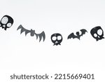 Skulls and flying bats cut out...