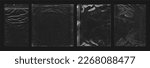 Small photo of Photo of various polyethylene packages on a black background. Polythene wraps for an overlay effect. This is a photograph of rumpled packages of various shapes and sizes.