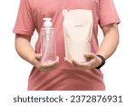 Small photo of Man choosing shampoo plastic packaging for refill pouch isolated on white background. Zero waste. Reuse reduce recycle concept.