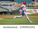 Small photo of Oakland, California - August 10, 2022: Los Angeles Angels DH Shohei Ohtani runs to first base during a game against the Oakland Athletics at the Oakland Coliseum.