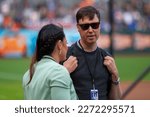 Small photo of August 1, 2022 - San Francisco: Jessica Mendoza and Dave Flemming, MLB announcers and Stanford graduates, talk on the field before a game between the San Francisco Giants and Los Angeles Dodgers.