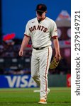 Small photo of April 10, 2023 - San Francisco: San Francisco Giants pitcher Logan Webb walks to the dugout at the end of an inning against the Los Angeles Dodgers at Oracle Park.