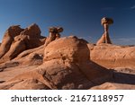 Small photo of Toadstool rock formations near Kanab, UT. USA. These geologic wonders are caused by erosion of soft sandstone underneath the harder stone on top, giving the impression of a 'toadstool'.
