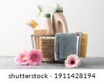 Brushes, sponges, cleaning cloth  and natural cleaning products in the basket.  Eco-friendly cleaning products. Spring freshness and purity concept 