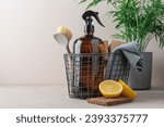 Zero waste cleaning supplies basket with spray glass bottle. Concept of natural cleaning products
