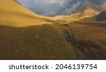 misty mountain and river aerial | Shutterstock . vector #2046139754