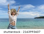 a happy woman is resting on the ... | Shutterstock . vector #2163993607