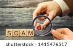 Small photo of Businessman puts wooden blocks with the word Scam. Fraudulent investment project. Illegal plan to get money. Cheating people. Raw deal. Financial Pyramide. Hacker attack