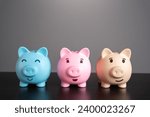 Three lucky piggy banks. Savings and deposit banking. Healthy economy. Diversification of investments and savings. Banking. Good conditions from the bank.