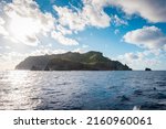Small photo of Landscape shot of famous island of Pitcairn where the Bounty mutineers settled after sinking their vessel