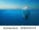 Small photo of Iceberg With Above And Underwater View Taken In Greenland. Iceberg - Hidden Danger And Global Warming Concept. Iceberg illusion creative idea
