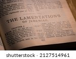 Small photo of Iloilo City, Philippines - December 9, 2021: The Book of Lamentations of Jeremiah, the Holy Bible Old Testament prophet. The text is originally set in Hebrew alphabet, poetry form.