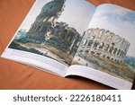 Small photo of Rome, Italy - October 26, 2022: Magazine showing a decaying Coliseum, as paganism transitioned to the papacy in the sixth century. History of Christianity. The Great Controversy.