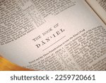 Small photo of Washington D.C., United States - January 31, 2023: The Book of Daniel of the Holy Bible Old Testament. The prophet in Babylonian captivity, prophesied of the coming of Messiah and His ministry.