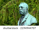 Small photo of Halmstad, Sweden - August 18, 2022: Bust of Goran Niklas Hammar with butterfly on his hose, Hammar was a Swedish merchant , vice consul and politician in Norre Katts Park