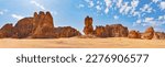 Rocky desert formations with sand in foreground, typical landscape of Al Ula, Saudi Arabia. High resolution panorama
